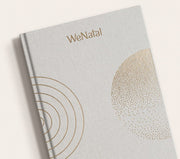 WeNatal Manifestation journal on a white background